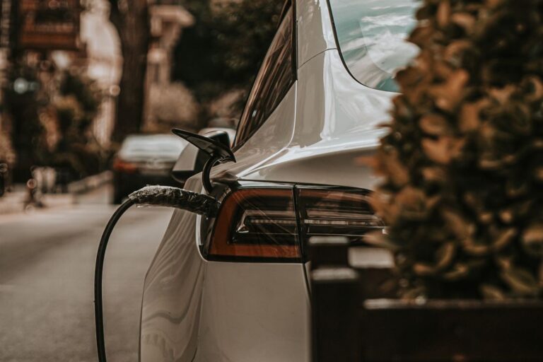Electric car plugged in at a charging point