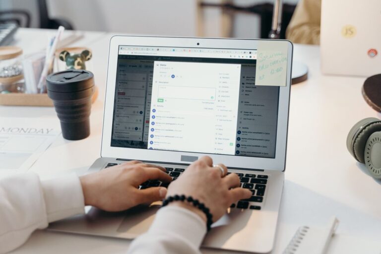 Person using a laptop at a table